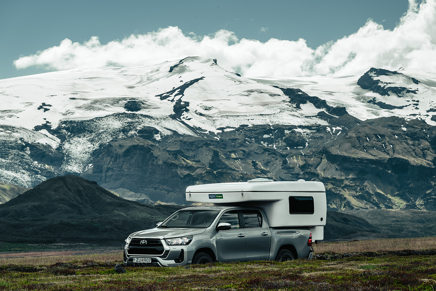 Toyota Hilux 4x4 Camper driving near Eyjafjallajokull in southern Iceland