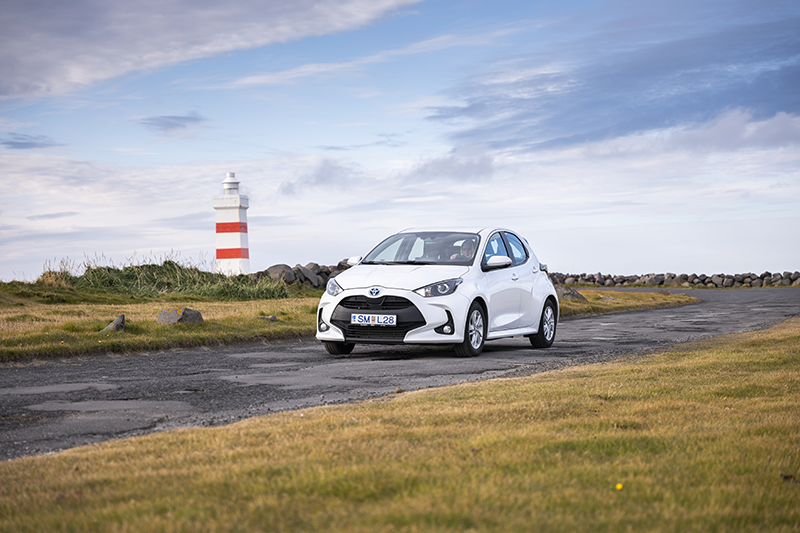 Small passenger rental car driving near Keflavik airport in iceland