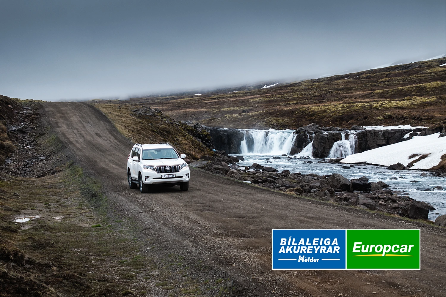 4x4 SUV driving on gravel road in norhern Iceland