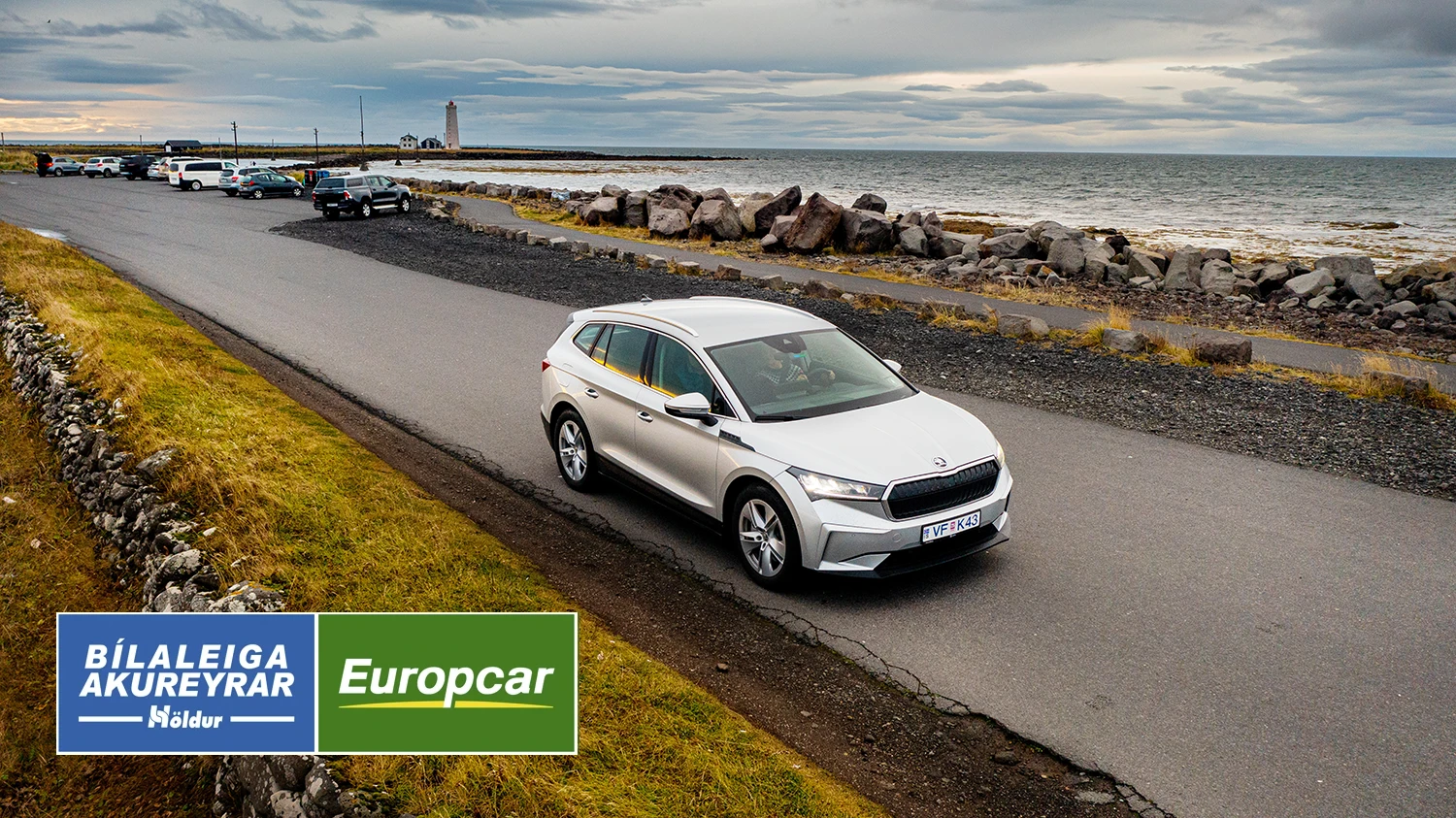 Couple driving electric renta a car from Holdur-car-rental in Iceland